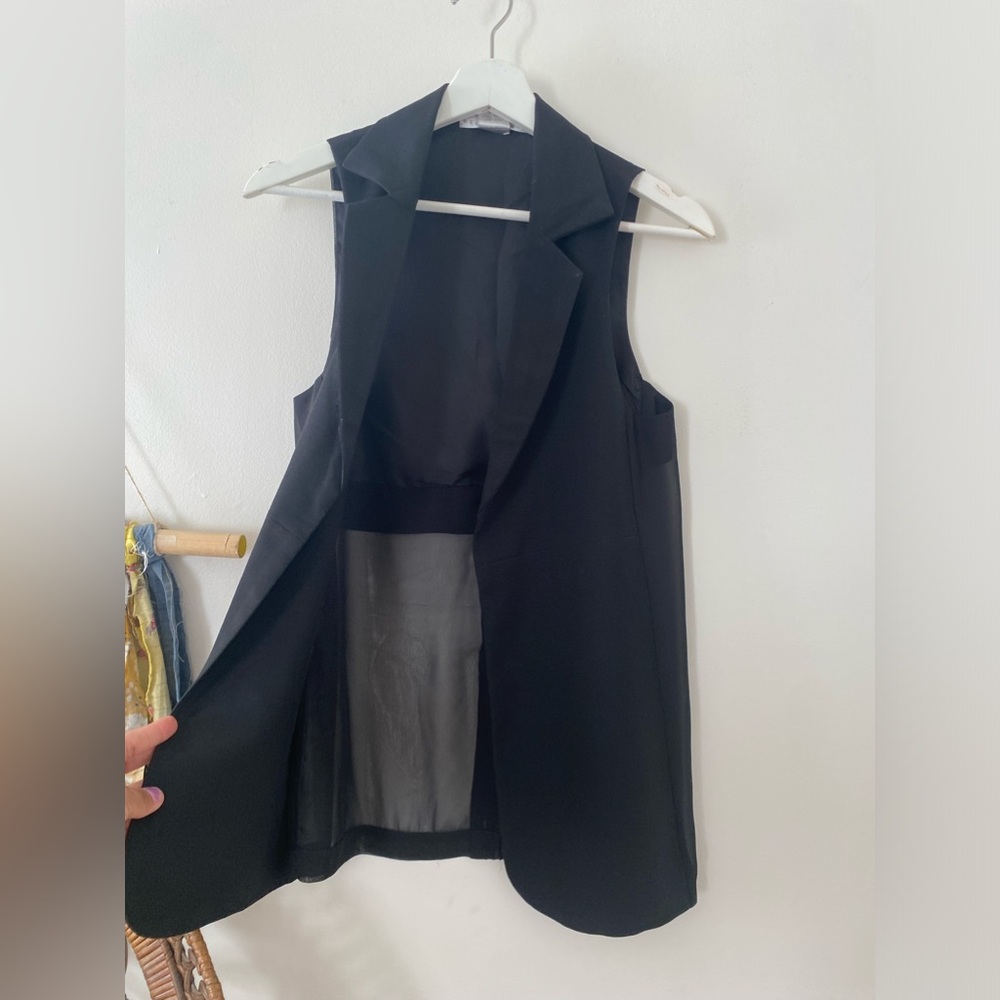 Collared black vest with sheer panel in the back